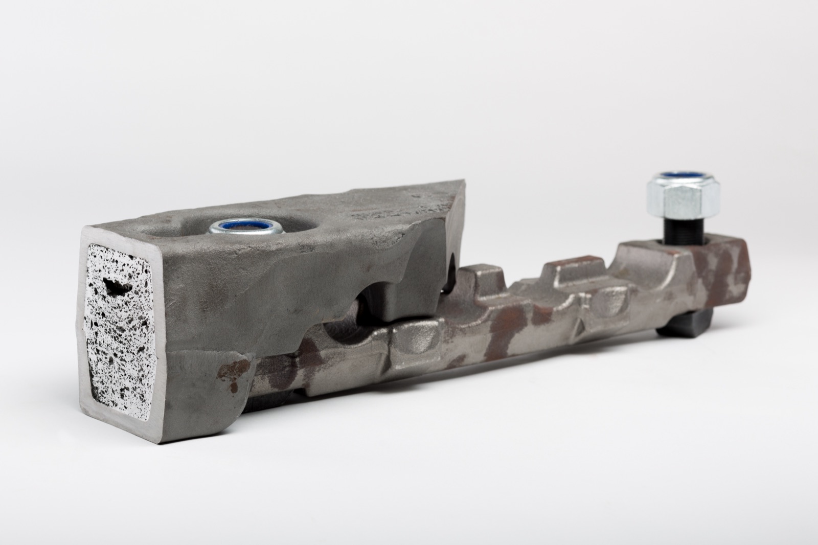A carrier for mining with a cut end; the cavity of the profile is filled with aluminum foam. At the opposite end there is a bolted joint.